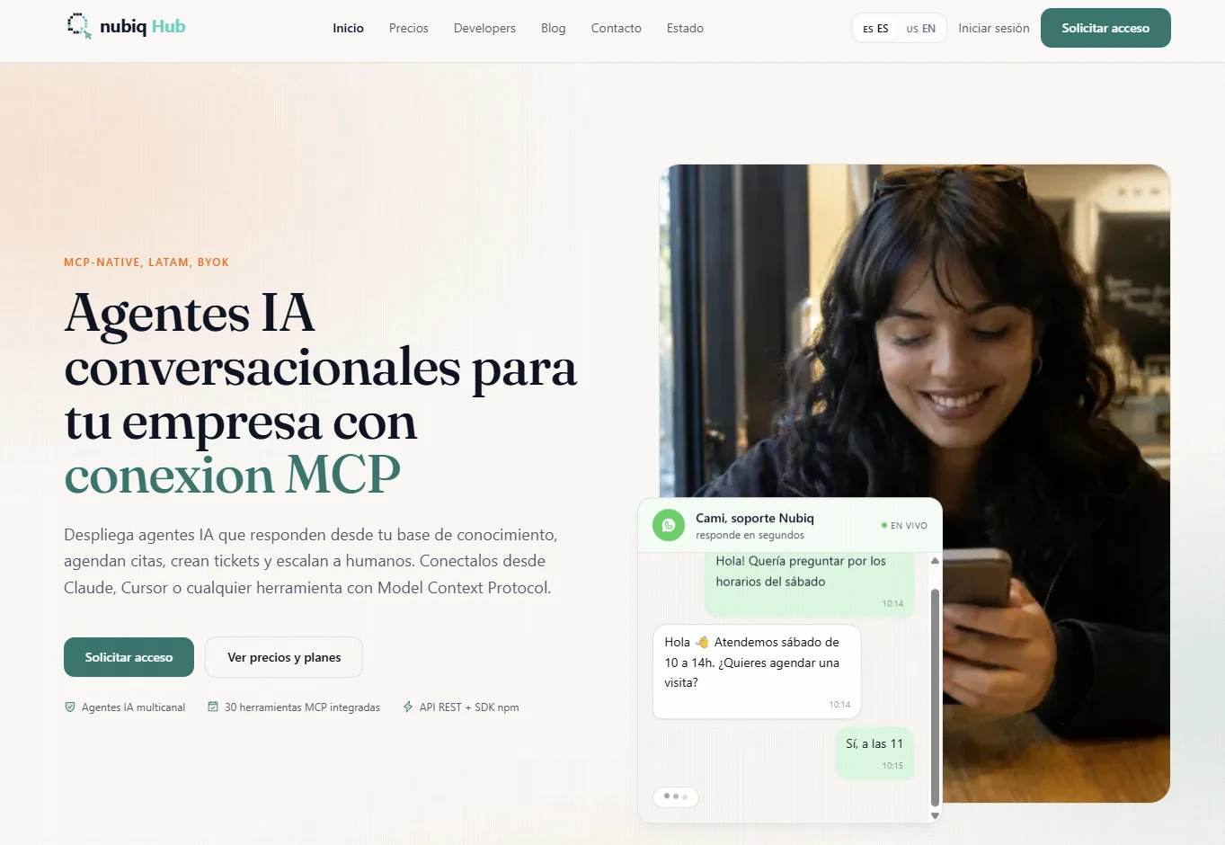 Landing de Nubiq Hub con chat WhatsApp en vivo